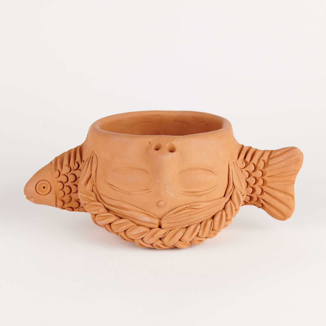 Teresita con Pez Vessel, Medium